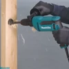 Kép 2/2 - Makita DP4021 Fúrógép, 630W 13mm gyorstokmány